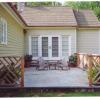 Kitchen wing deck showing mahogany  herringbone railing